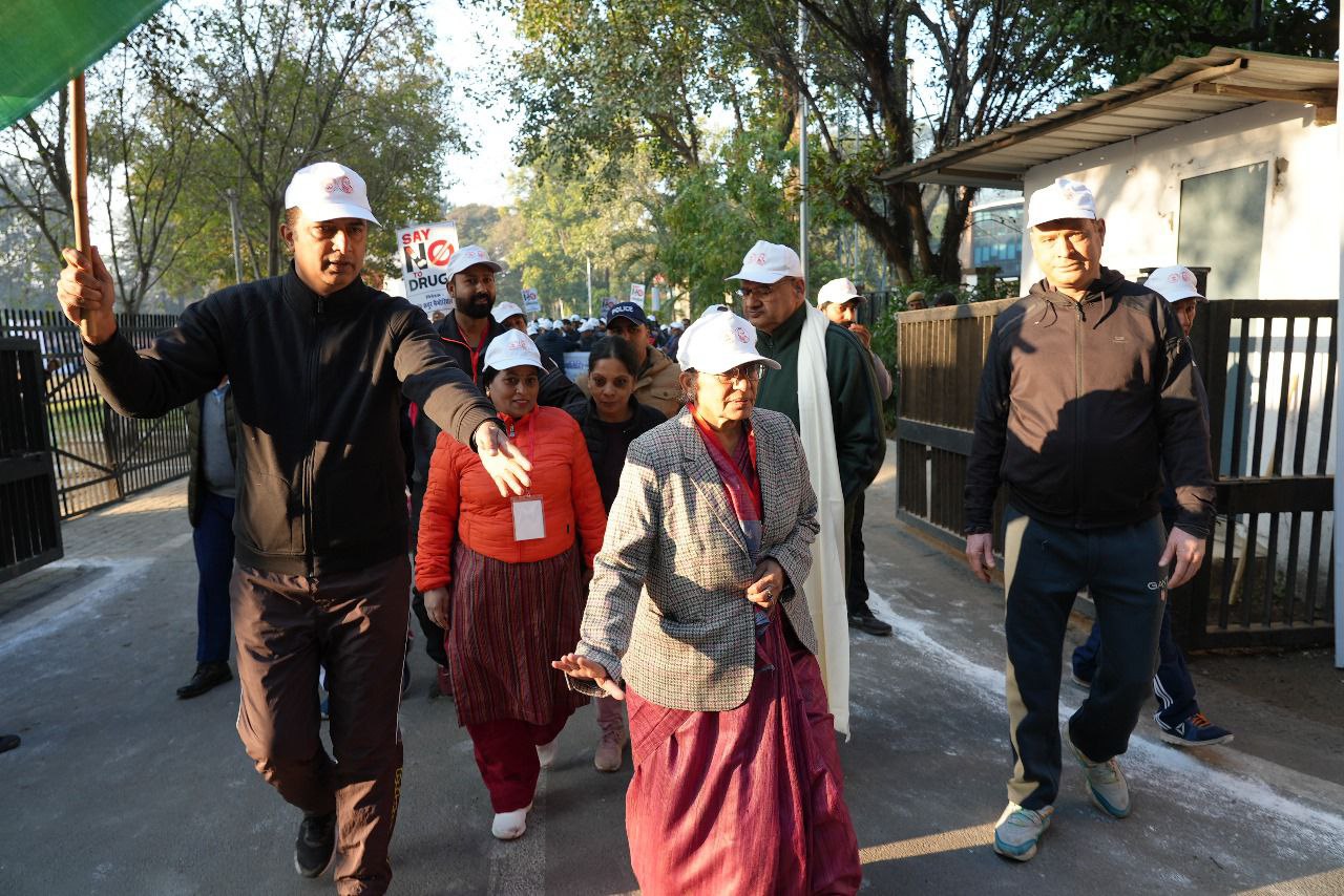 Savita Kapoor giving a speech at an event
